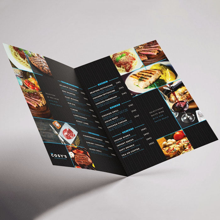 Folded restaurant menu with food images and text on a gray background